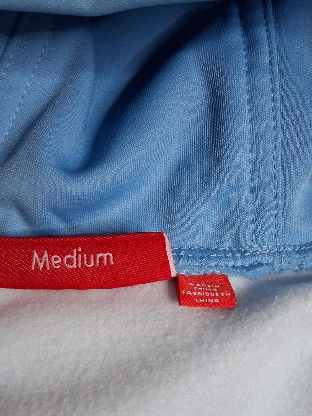 Supreme Light Blue Zip-Up Hoodie with Racing Patches